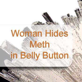 A woman faces charges after hiding meth in her belly button.