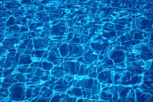 A man went skinny dipping in a hotel pool and now faces Public Indecency charges.