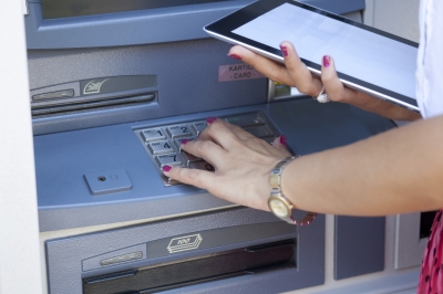 A man was arrested for Identity Theft after shoulder surfing and looking over a woman's shoulder to get her PIN number to access her bank account.