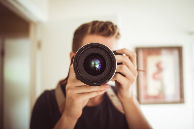 Hiding a camera in an Airbnb to get photos and videos of guests is charged as Invasion of Privacy for Sexual Gratification. Read more about it here.