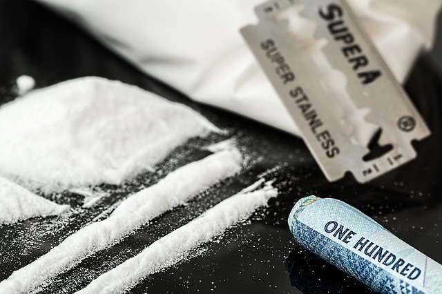 A college freshman was sentenced to four years in prison for possession with intent to distribute and sell after his drug business was discovered.